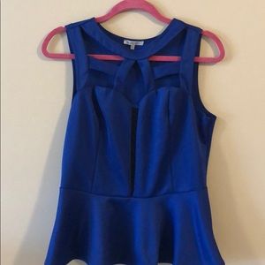 Peplum cutout and mesh top